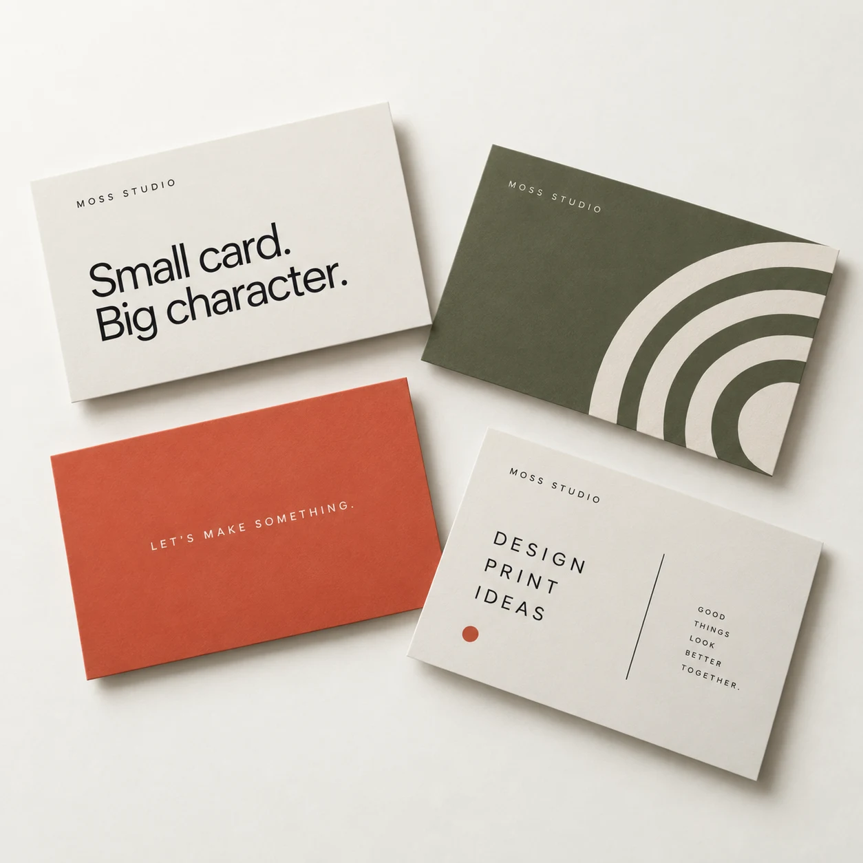 Coordinated olive, ivory and vermilion business card design concepts showing expressive fronts and considered reverse sides