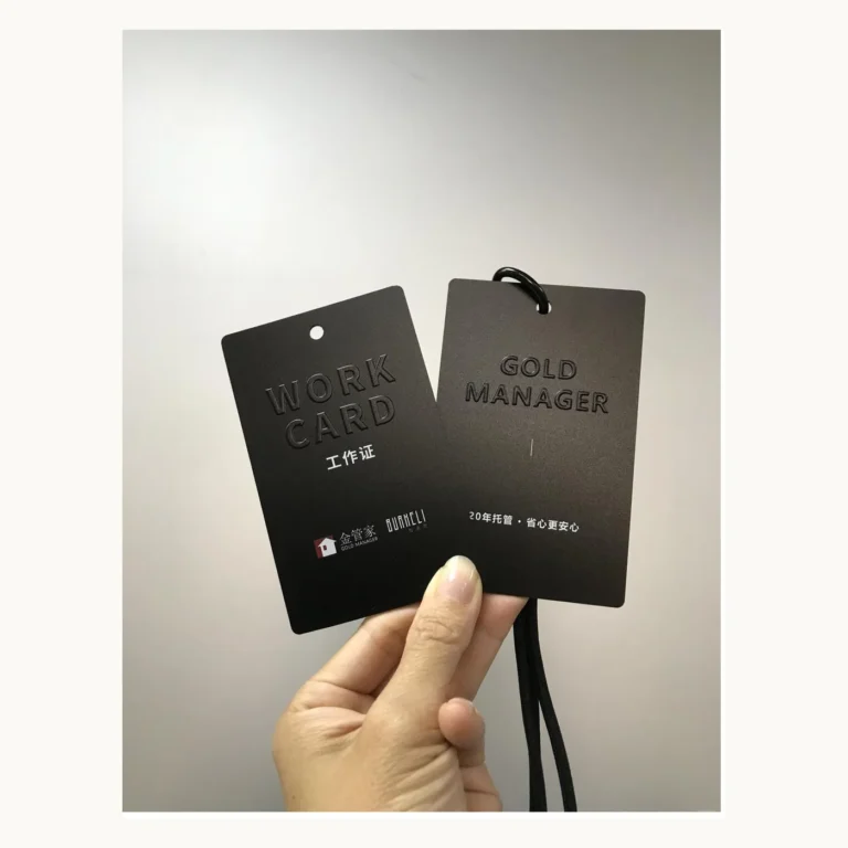 Photograph of Black Work Card and Gold Manager Badge Pair