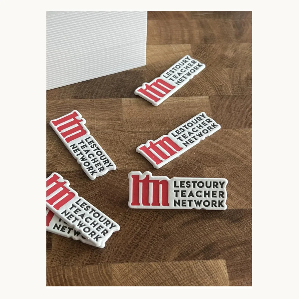 Photograph of Inkless Relief Letterpress Paper Badges