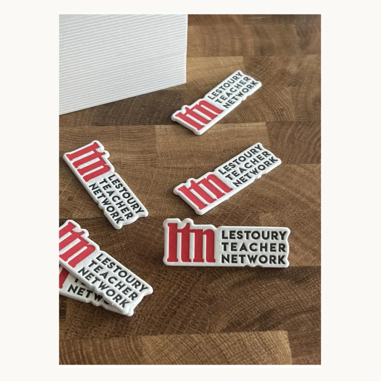 Photograph of Inkless Relief Letterpress Paper Badges