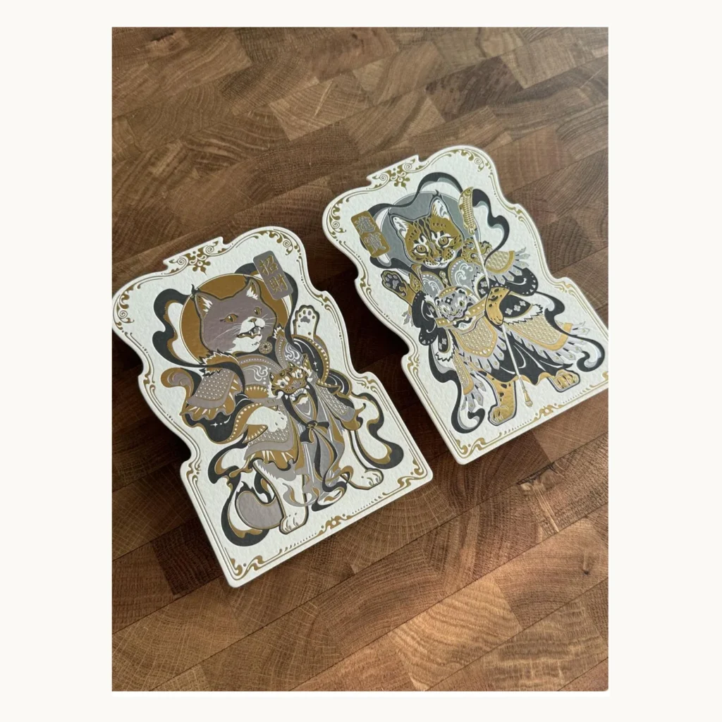 Photograph of Gold-and-Silver Foil Illustrated Letterpress Cards