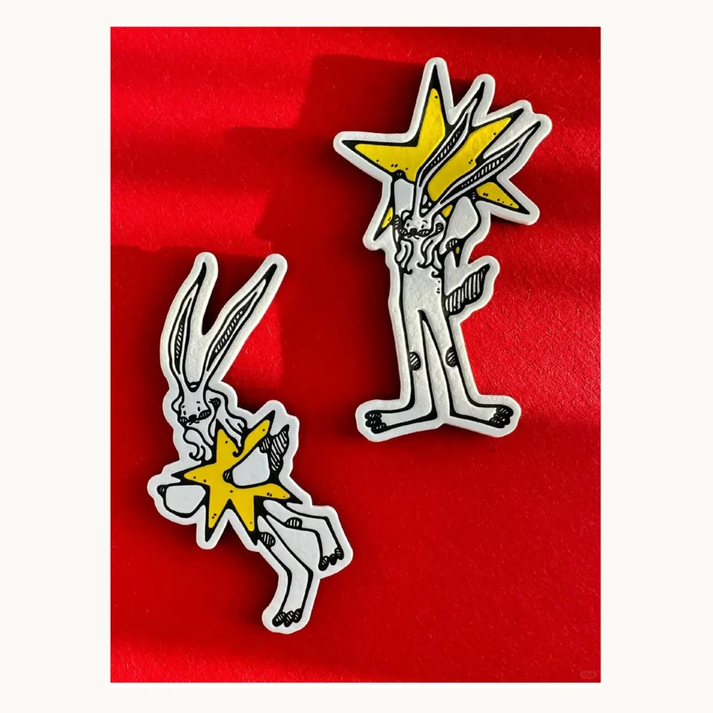 Photograph of Flying Rabbit and Star Letterpress Magnets
