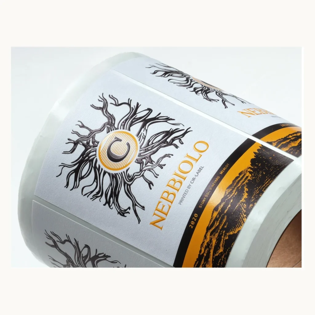 Photograph of White Wine Labels with Black Botanical Linework and Gold Edge