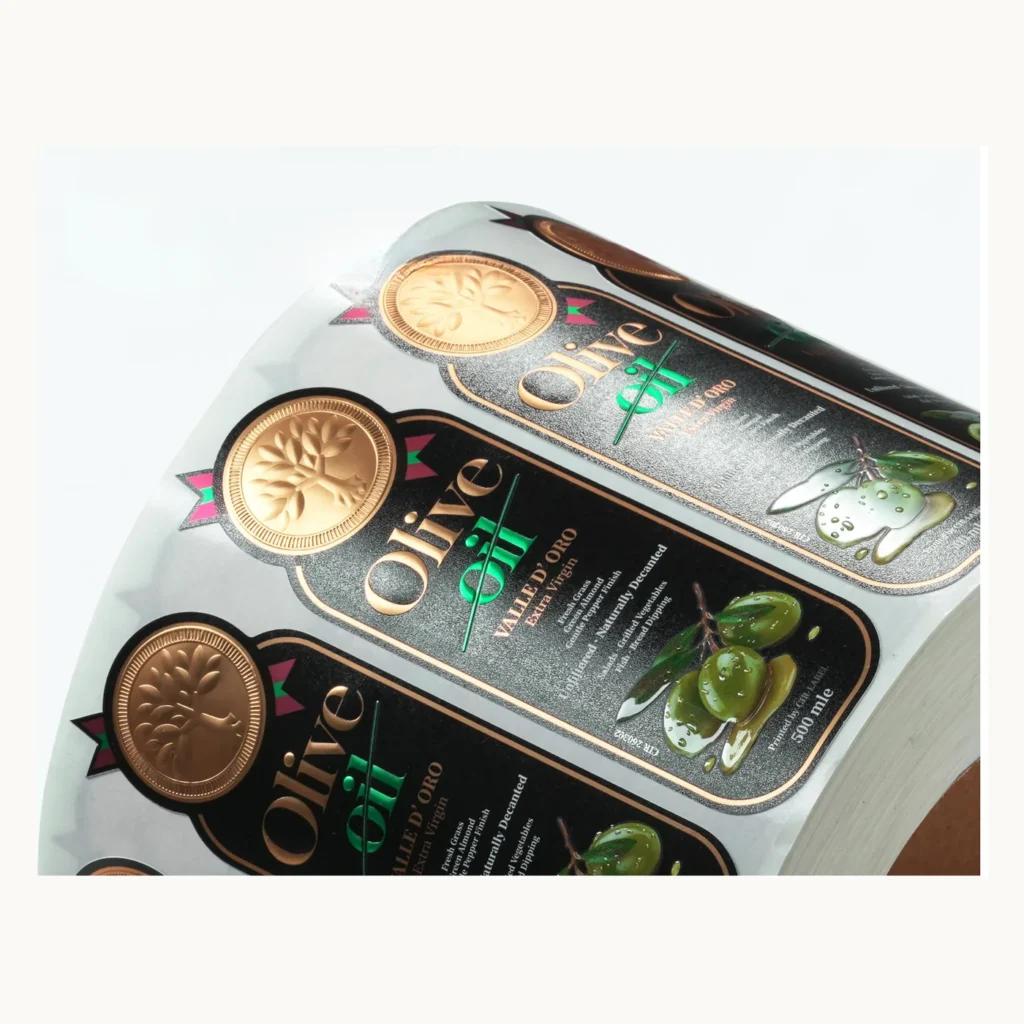 Photograph of Silver Olive Oil Labels with Raised Droplet Details