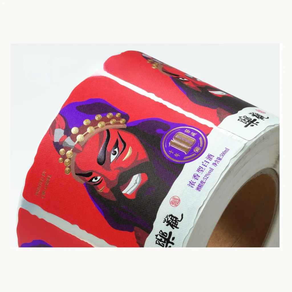 Photograph of Red Baijiu Labels with Mask Illustration and Gold Details