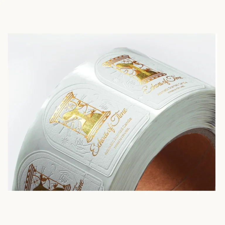 Photograph of White Wine Labels with Gold Sand-Like Relief