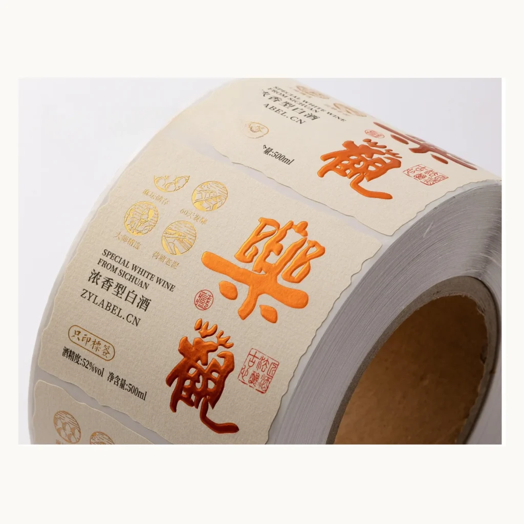 Photograph of Cream Baijiu Labels with Orange Calligraphy