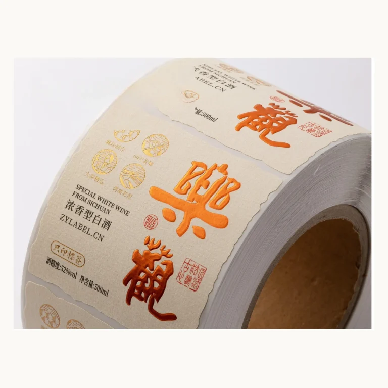Photograph of Cream Baijiu Labels with Orange Calligraphy