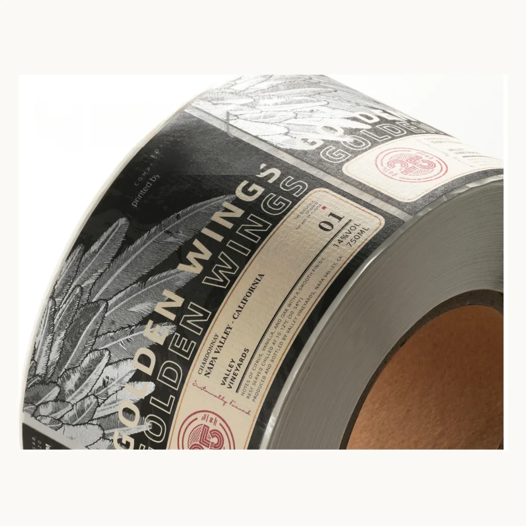 Photograph of Black and Cream Wine Labels with Dense Engraved Artwork