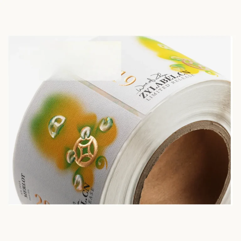 Photograph of White Fruit Wine Labels with Raised Gold and Green Accents