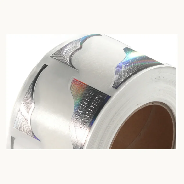 Photograph of Silver Perfume Labels with Iridescent Cut Shapes