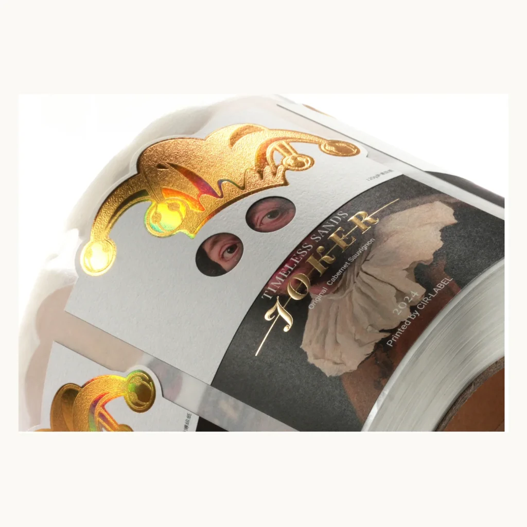 Photograph of Black Mask Wine Labels with Sculpted Gold Detail