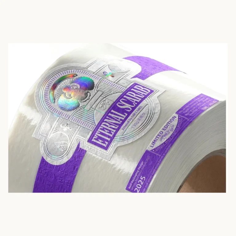Photograph of Purple and Silver Wine Labels with Raised Oval Motif