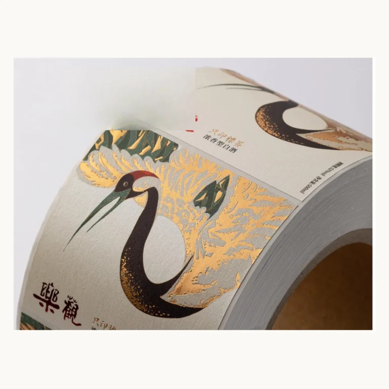 Photograph of Cream Baijiu Labels with Crane Illustration