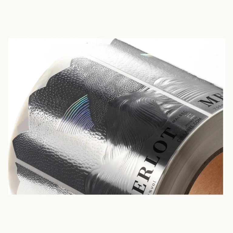 Photograph of Silver Wine Labels with Dark Flowing Landscape