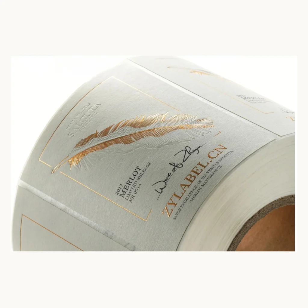 Photograph of Ivory Red Wine Labels with Gold Feather Detail