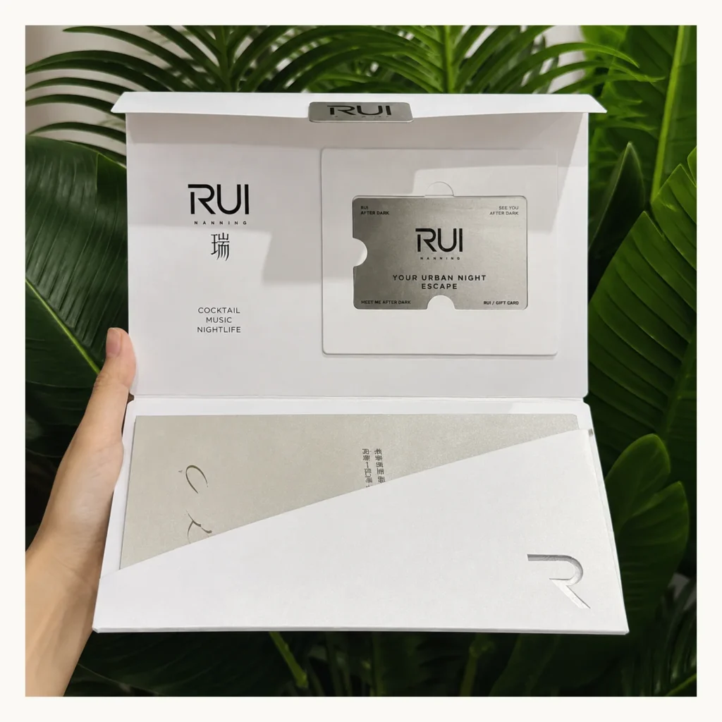 Photograph of White RUI Gift Card Presentation Folder