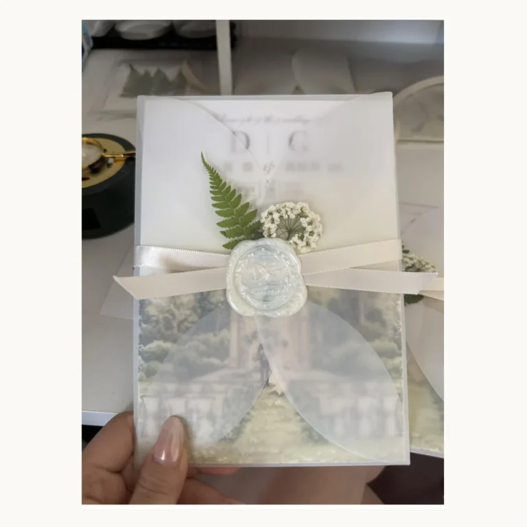 Photograph of Translucent Botanical Wax-Sealed Wedding Suite