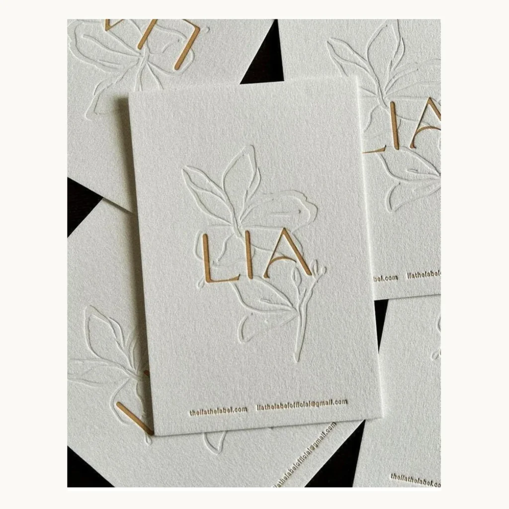Photograph of LIA White Floral Relief Business Cards