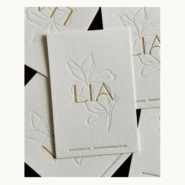 Photograph of LIA White Floral Relief Business Cards