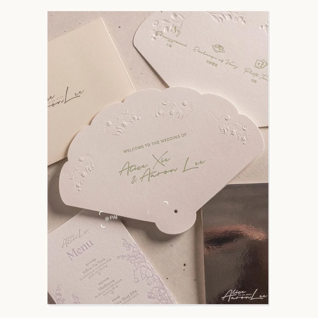 Photograph of Scalloped White Wedding Stationery Suite