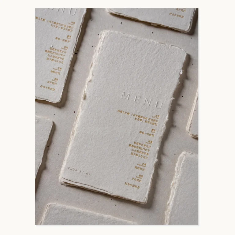 Photograph of Minimal Handmade Paper Wedding Menus with Deckle Edges