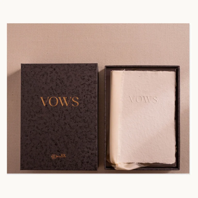 Photograph of White Handmade-Paper Wedding Vow Cards in Box