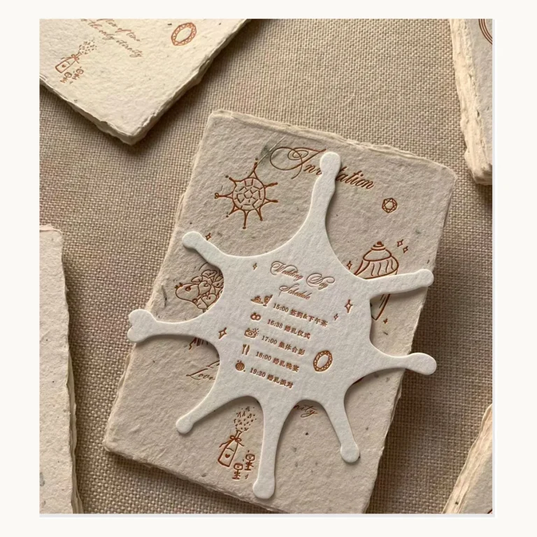 Photograph of Coastal Handmade-Paper Invitations with Sea Motifs
