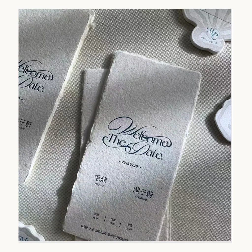 Photograph of Blue-and-White Shell-Shaped Wedding Invitations