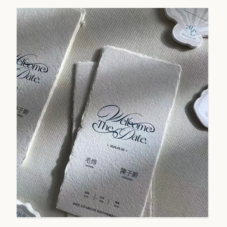 Photograph of Blue-and-White Shell-Shaped Wedding Invitations