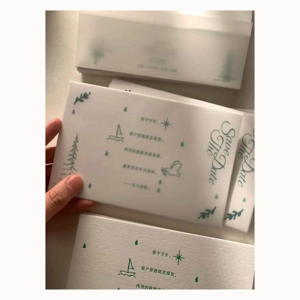 Photograph of Vellum-Wrapped Letterpress Wedding Invitations
