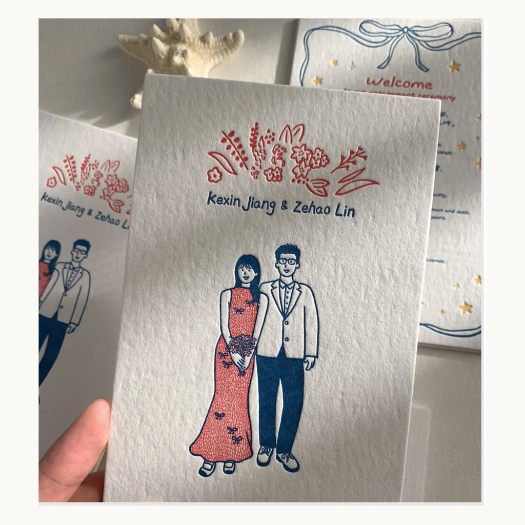 Photograph of Red and Blue Illustrated Couple Invitations