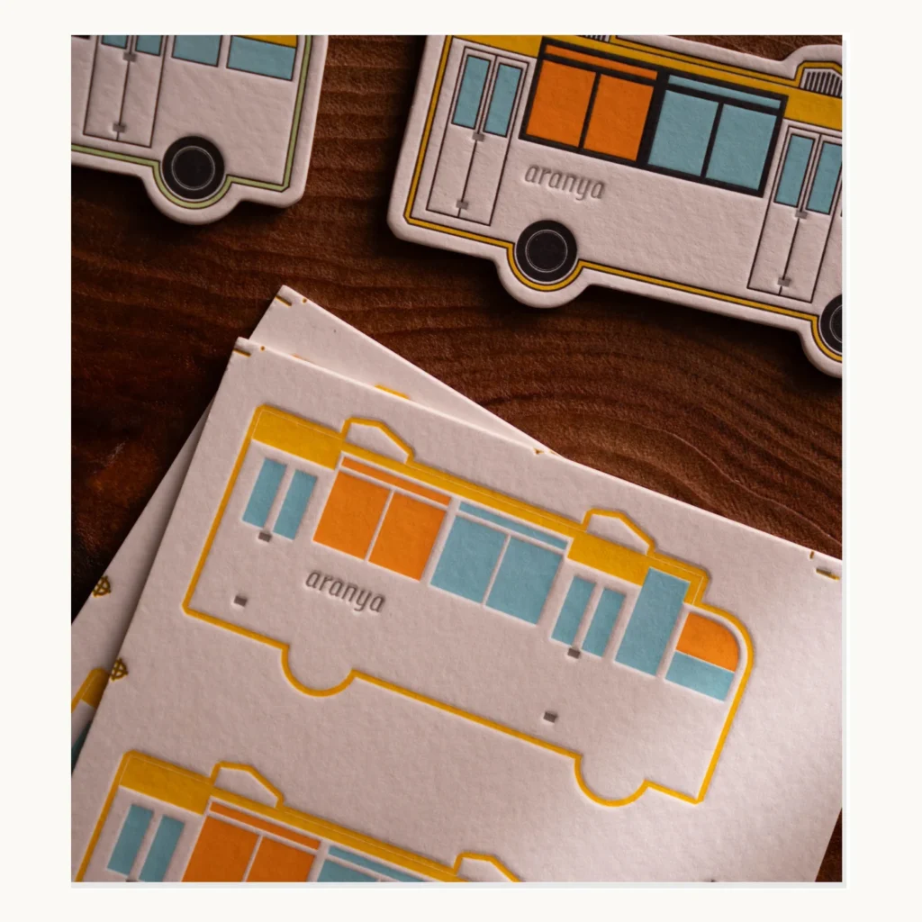 Photograph of Four-Color Illustrated Bus Route Fridge Magnets