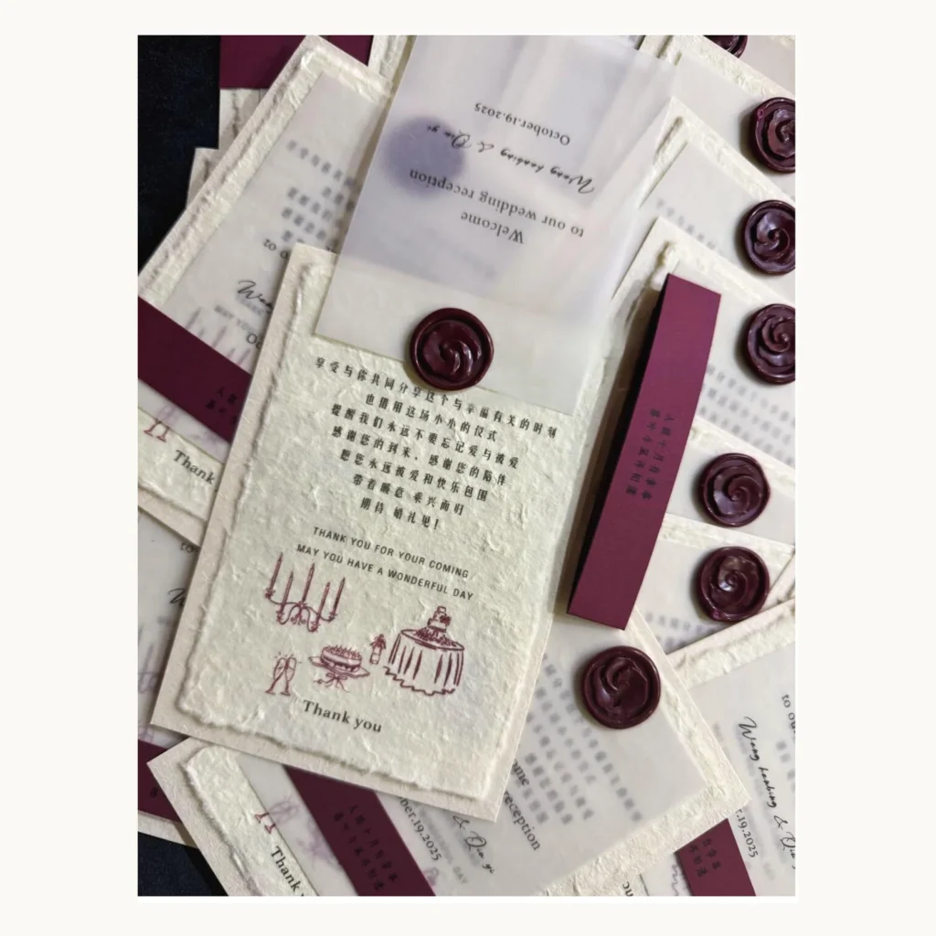 Photograph of Burgundy Wax Seal Wedding Invitations