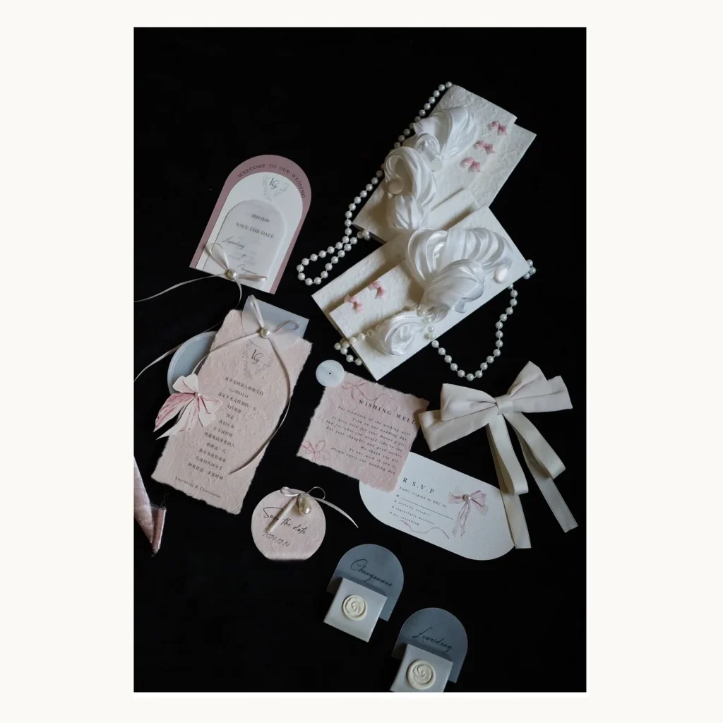 Photograph of Pink Bow Wedding Paper Suite