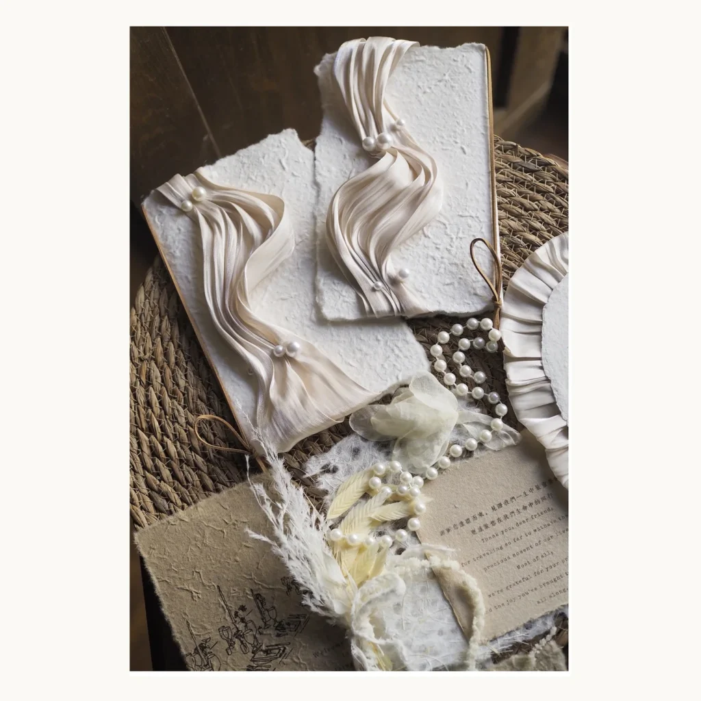 Photograph of Ivory Draped Wedding Vow Books