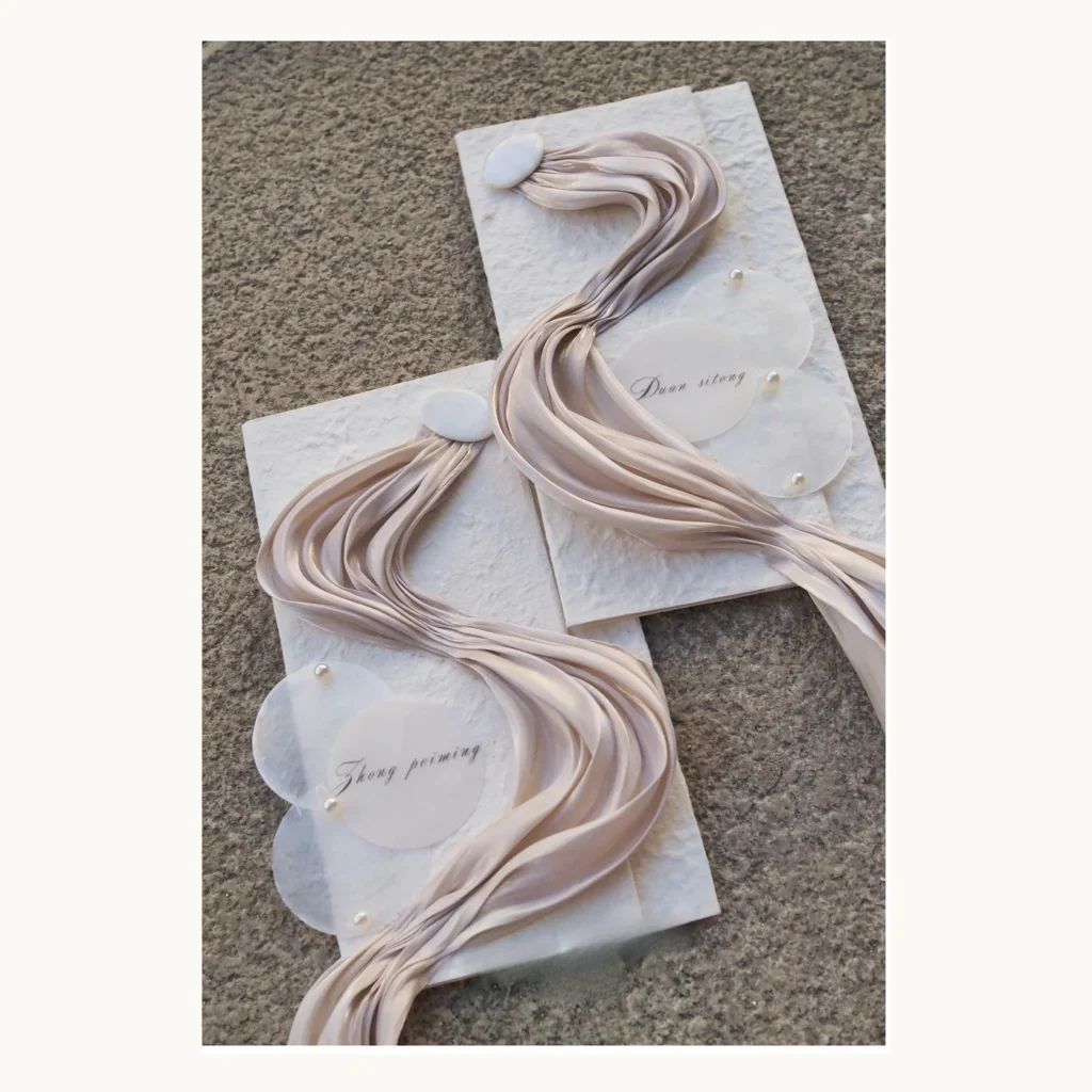Photograph of Champagne Satin Wedding Vow Books