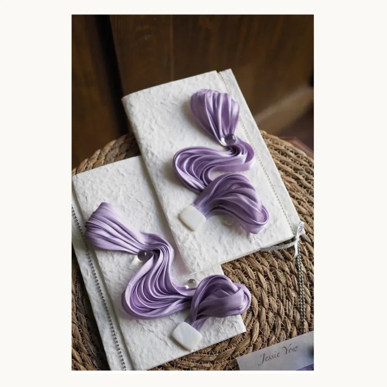 Photograph of Lavender Draped Wedding Vow Books