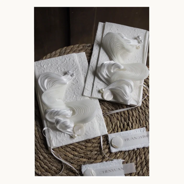 Photograph of Pure White Sculptural Vow Books