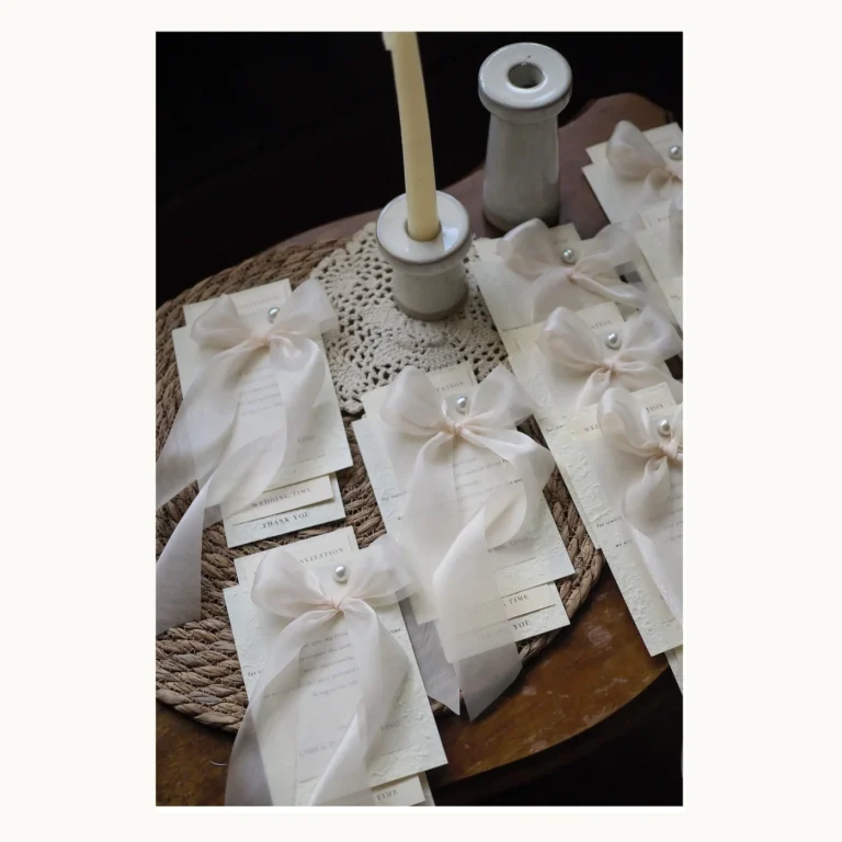 Photograph of Ivory Bow Wedding Invitations