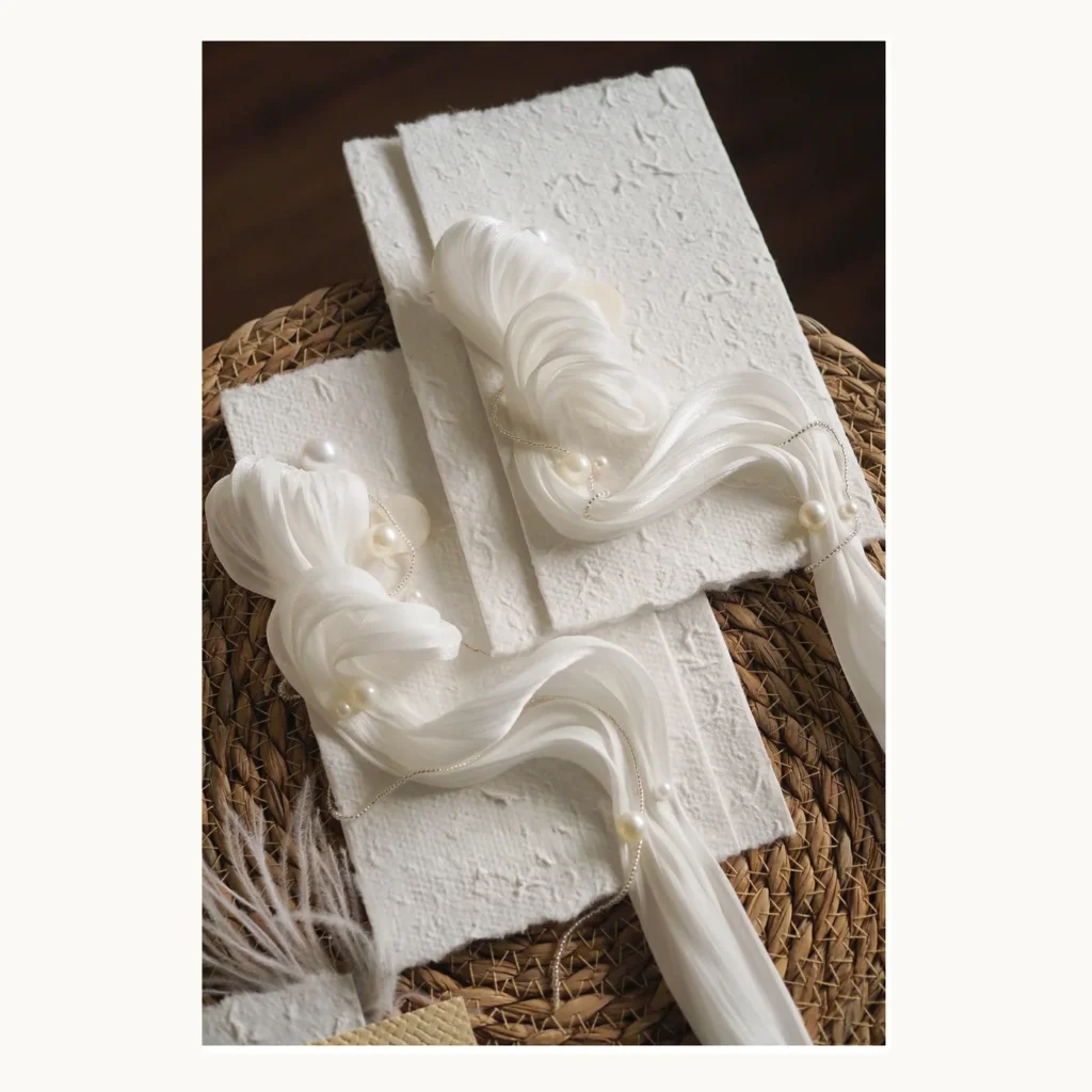 Photograph of White Draped Ceremony Vow Books