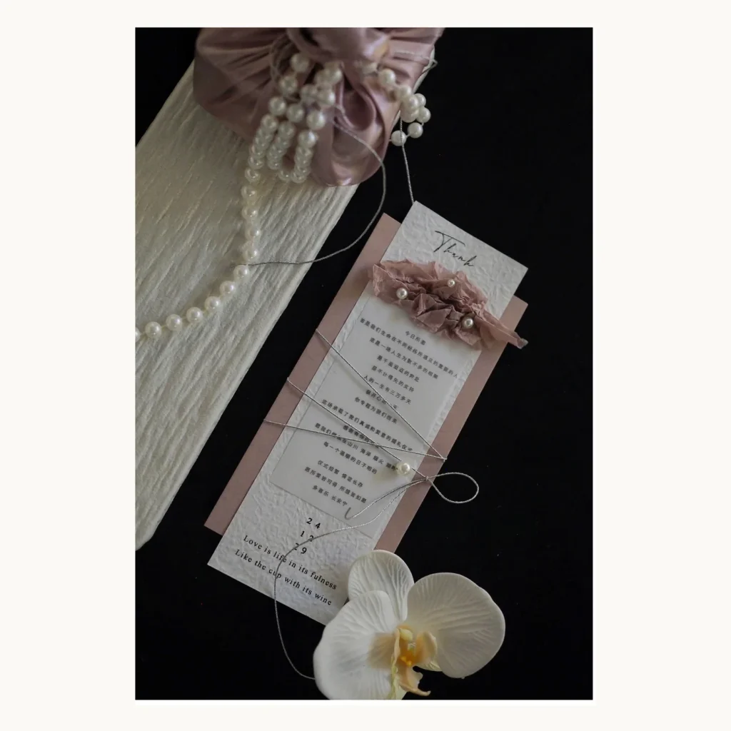 Photograph of Smoky Pink Handmade Wedding Invitations