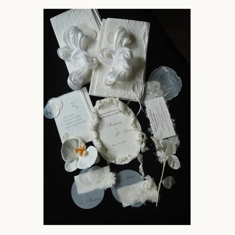 Photograph of Pure White Fabric Wedding Vow Books