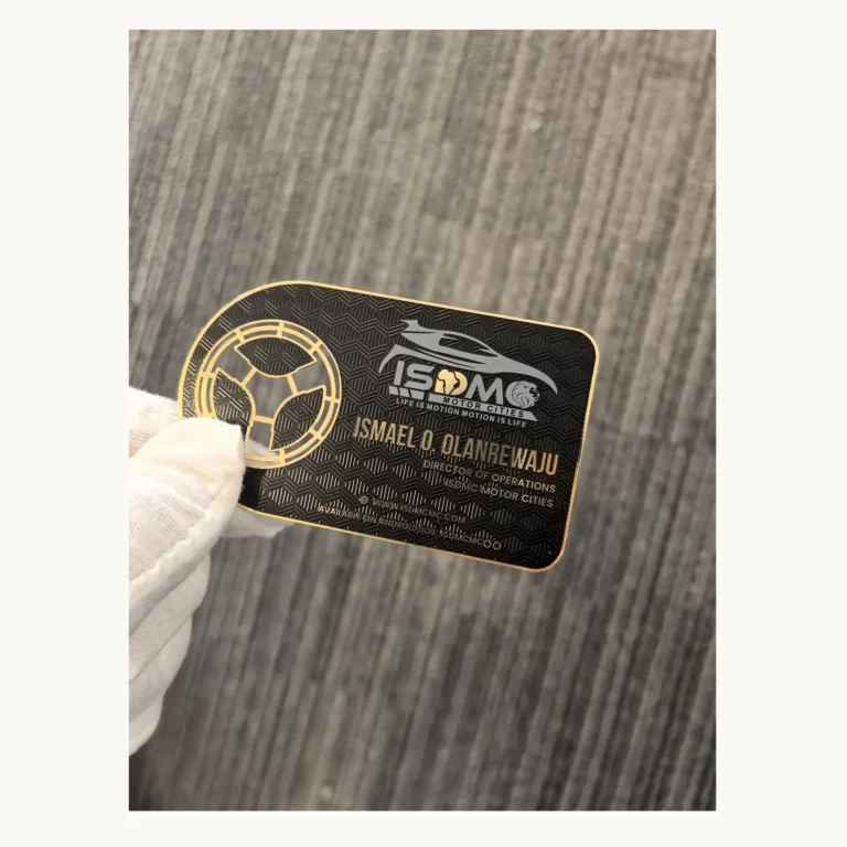 Photograph of Black and Gold ISMO Motor Cities Metal Card