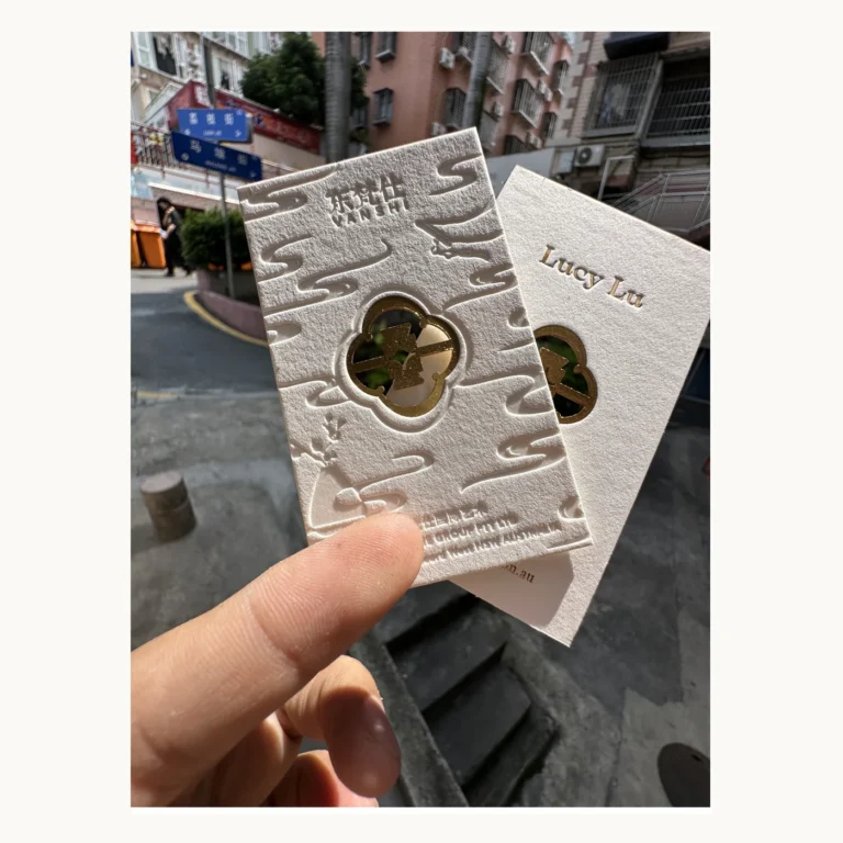 Photograph of Lucy Lu White Relief and Gold-Mirror Cards