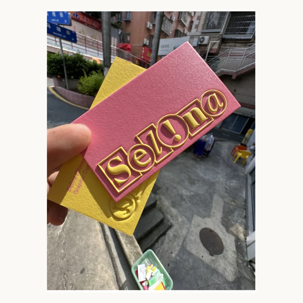 Photograph of Pink SayOne Gold Relief Business Cards