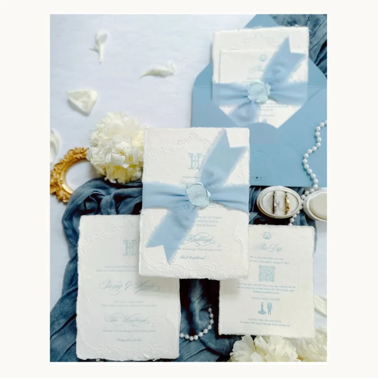 Photograph of Pale-Blue Ribbon Wedding Invitation Suite