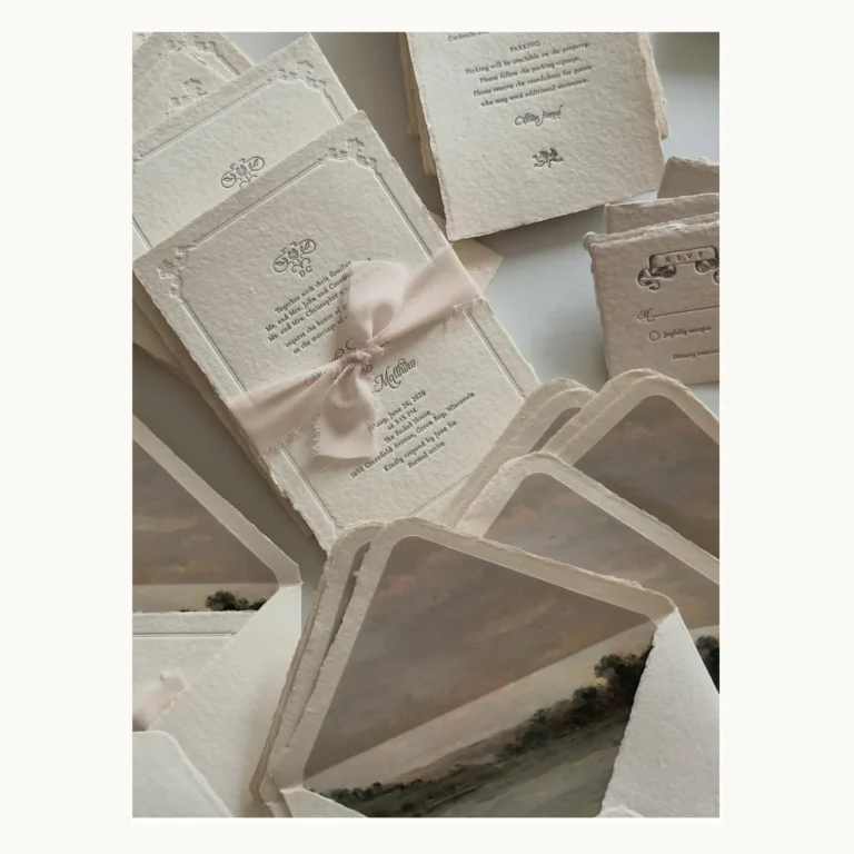 Photograph of Cream Ribbon-Layered Wedding Invitation Set