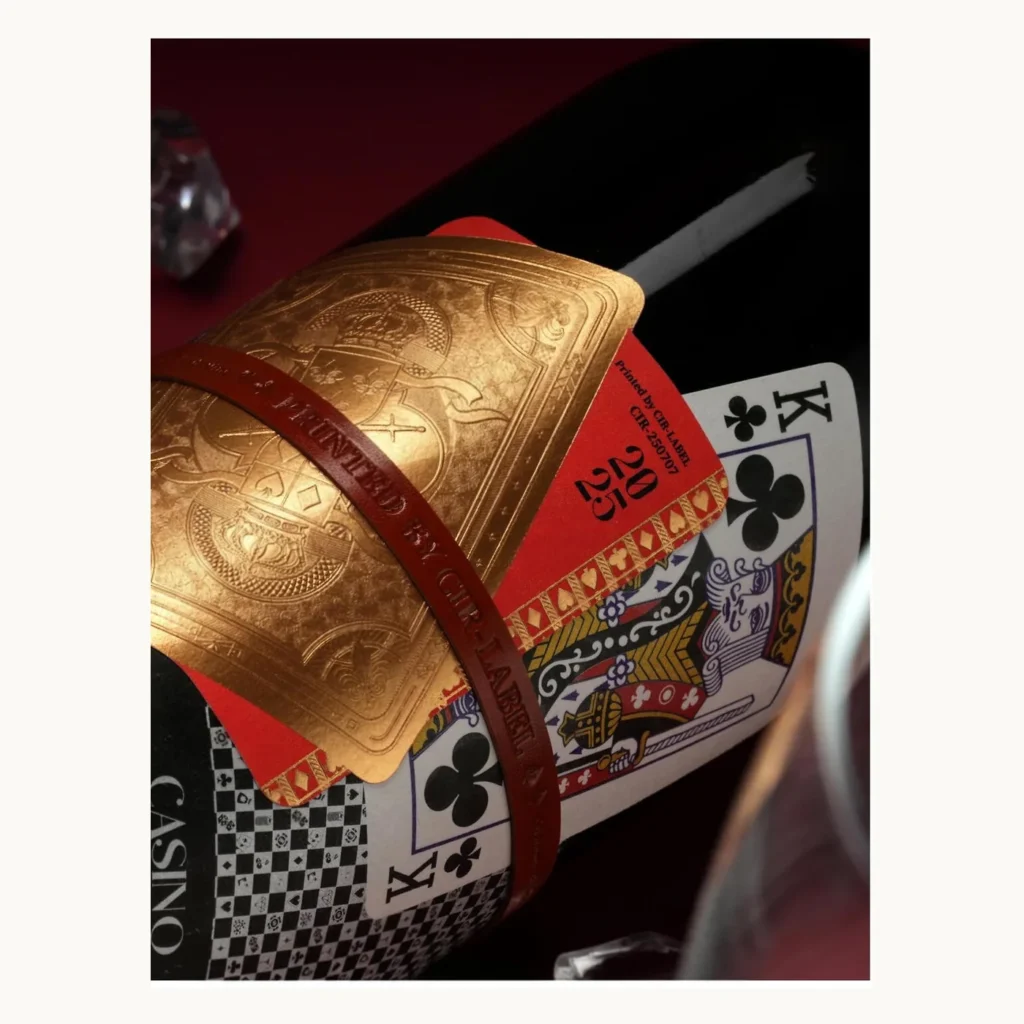 Photograph of Black and Gold Playing-Card Wine Bottle Labels
