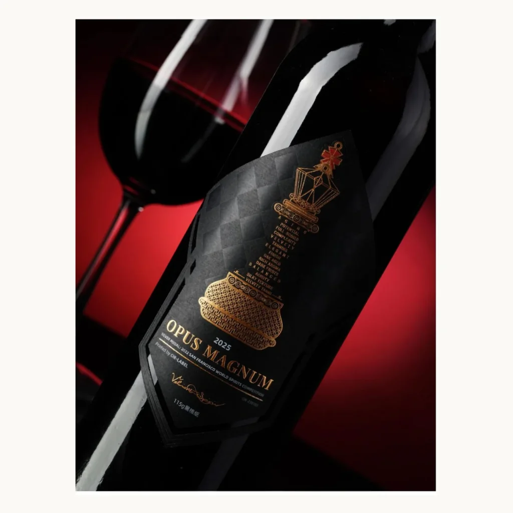 Photograph of Black Bottle Wine Labels with Gold Architectural Motif